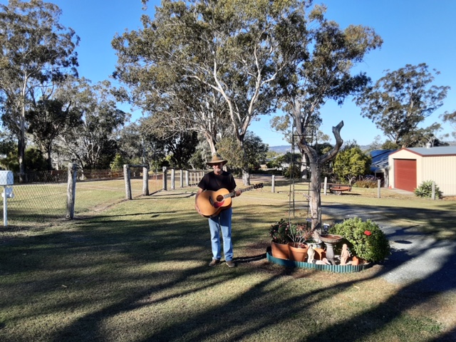 Ian with a McIlroy Acoustic Guitar in Queensland